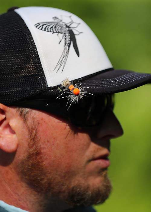 Justin Pickett has a hopper pattern fly ready to go on his hat.