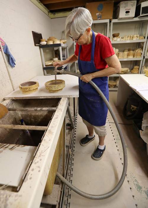 Priscilla Wilson works in her studio making pottery at The Gourd Place.