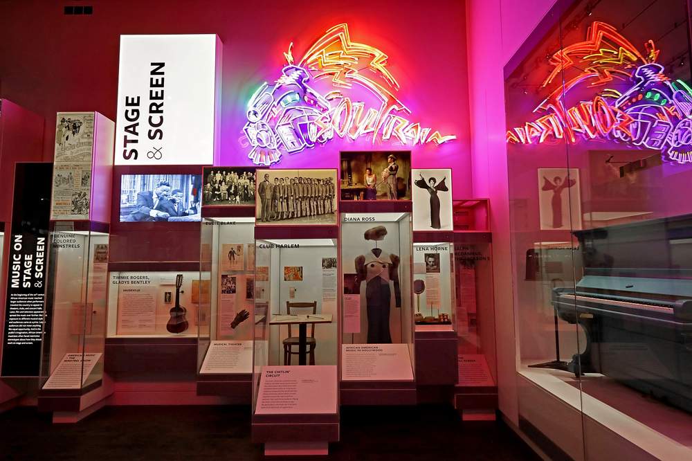 Instruments, costumes and other artifacts fill the Taking the Stage section of the fourth floor Culture Galleries. (Chip Somodevilla\/Getty Images)
