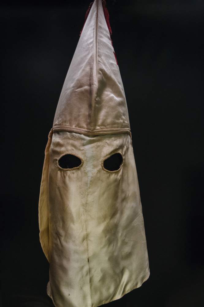 A Ku Klux Klan hood, one of many artifacts at the new National Museum of African American History and Culture, on the National Mall in Washington, Sept. 12, 2016. (Lexey Swall\/The New York Times)