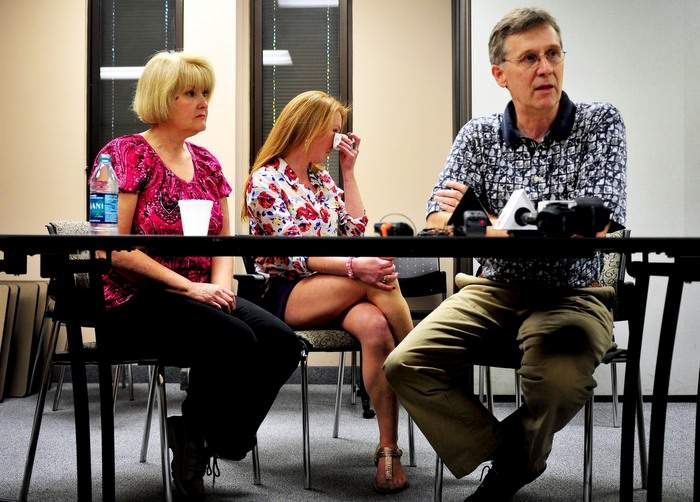 Aimee’s sister Paige Copeland, center, cries as her parents Donna and Andy Copeland speak to the media about the decision to amputate Aimee’s hands and remaining foot at Joseph M. Still Burn Center in Augusta. AP Photo\/The Augusta Chronicle, Emily Rose Bennett