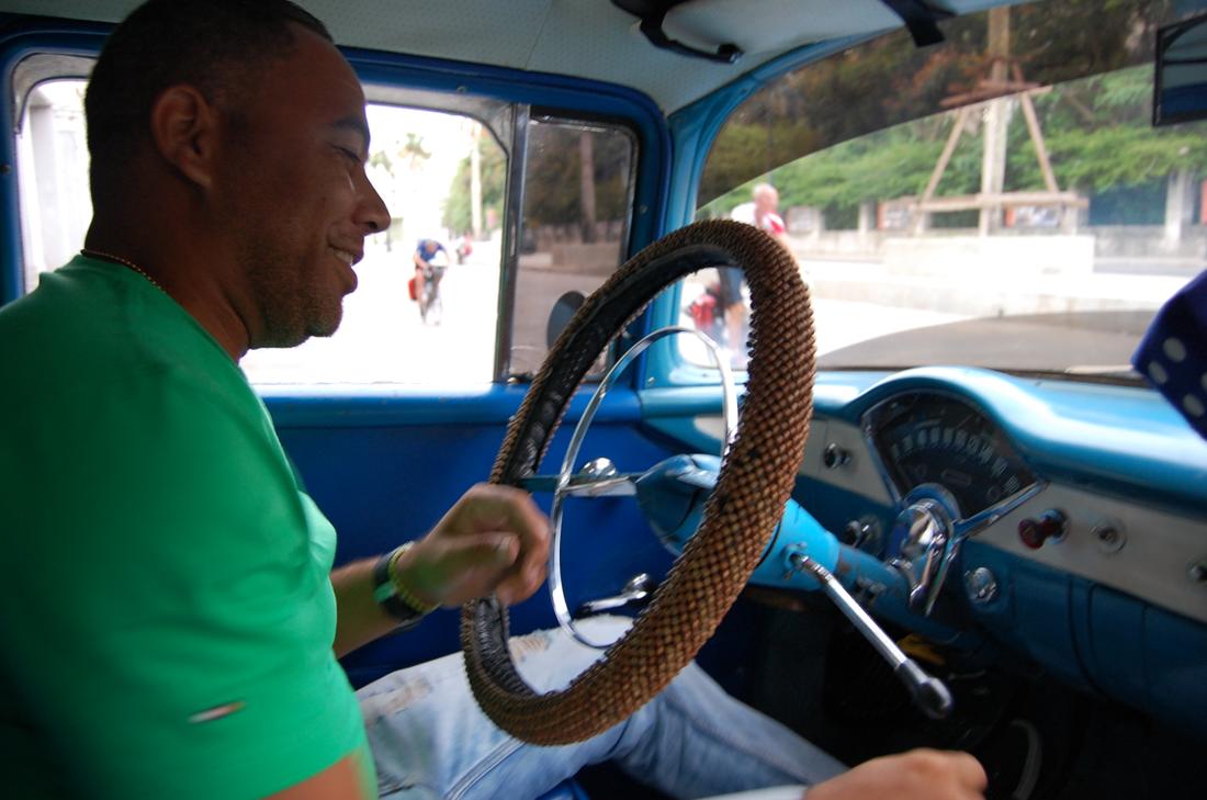 A taxi driver navigates the streets of Havana. Many Cubans have college degrees but are unable to find jobs in their field of study. Many turn to working in tourism or driving taxis.Photo: Katie Leslie / kleslie@ajc.com