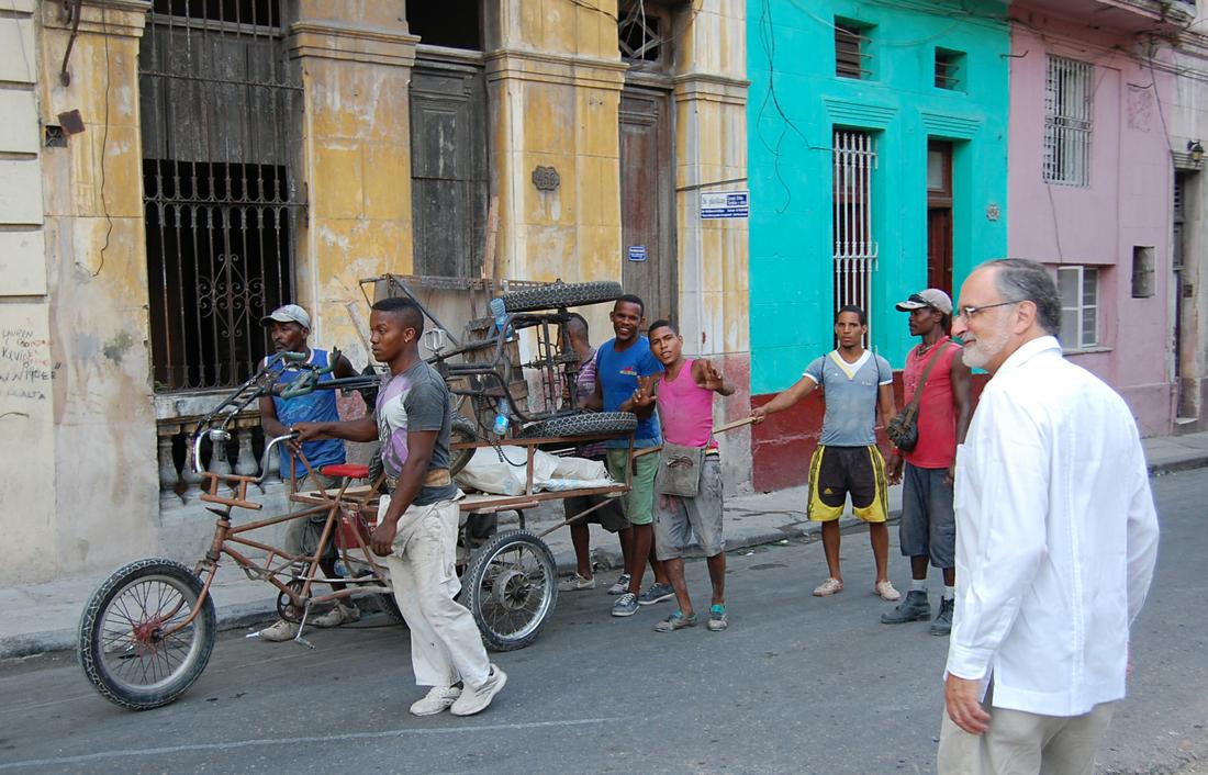Havana locals mug for a reporter's camera as World Affairs Council President Charles Shapiro looks on. Many Cubans enjoyed talking with reporters on the trip but were still reluctant to be quoted.Photo: Katie Leslie / kleslie@ajc.com
