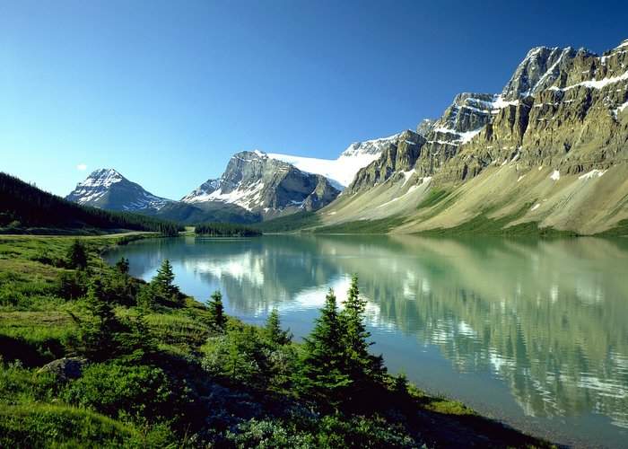 Bow Lake at Banff National Park in Alberta is surrounded by millions of acres of wilderness areas, forest reserves and provincial parks. Courtesy of Travel Alberta