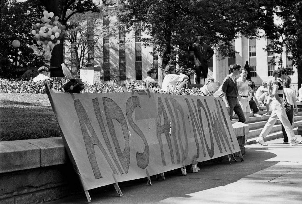 "AIDS Aid Now" sign at the Georgia State Capitol during an AIDS rally and vigil in 1988. Billy Downs\/AJC