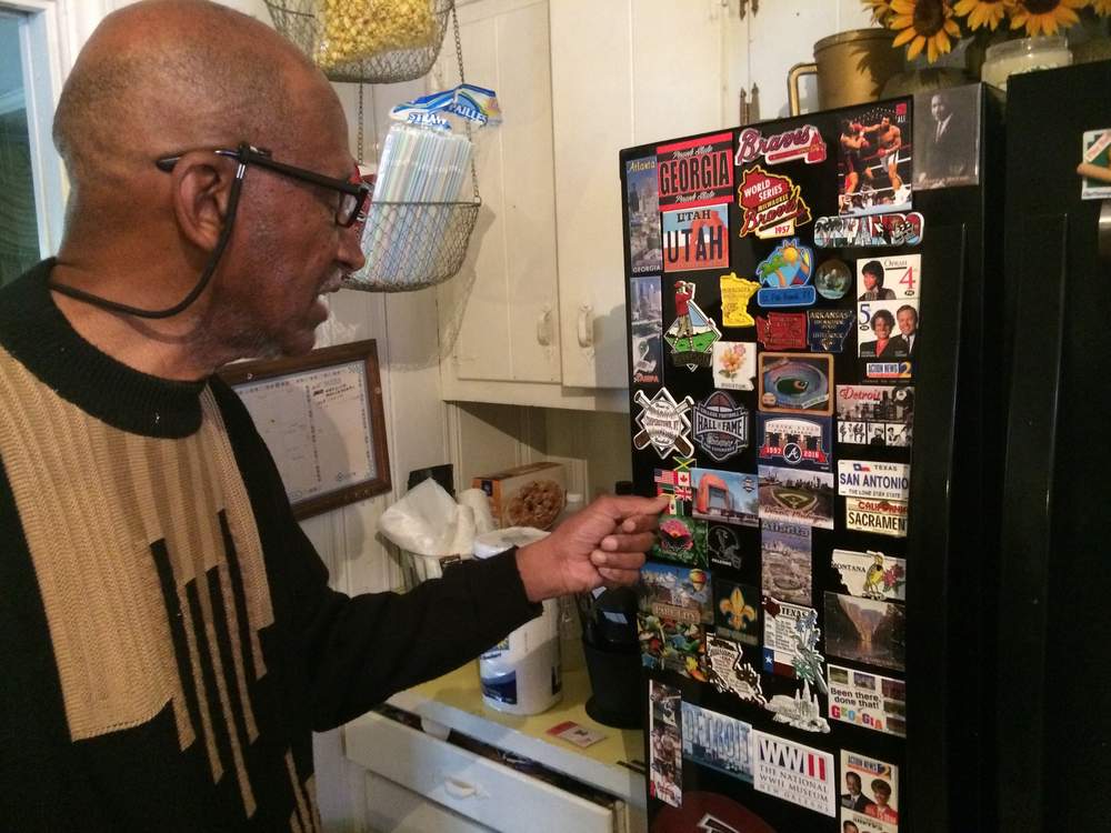 Banks loves to travel. He researches each destination thoroughly and likes to collect magnets to commemorate his trips. Photo: Jennifer Brett