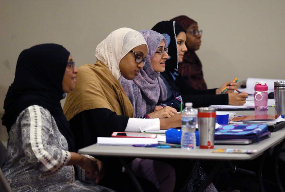 Female students take part in a class at the Madina Institute. Muslim leaders say having American born, American trained religious leaders is important to the community and a bulwark against potential radicalization.PHOTO: Bob Andres \/ AJC