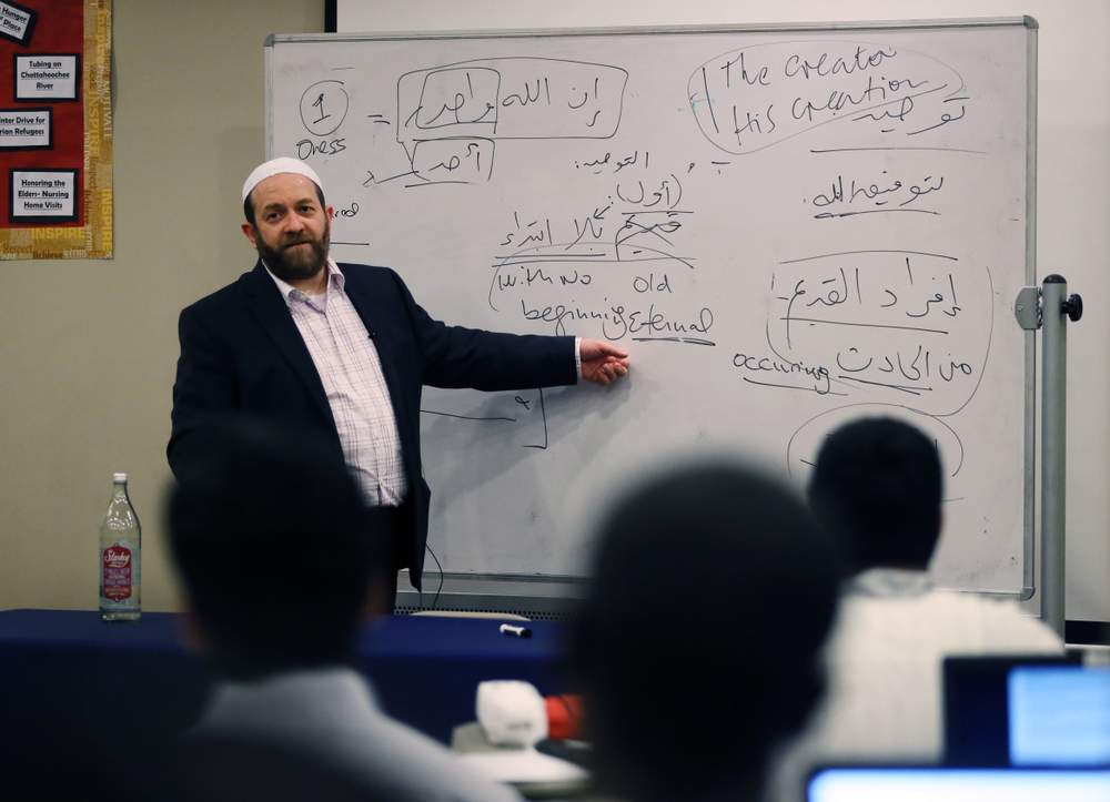 Muhammad Ninowy teaches a class in the &quot;Islamic Creed,&quot; or &quot;Aqeeda,&quot; at the Madina Institute in Duluth.PHOTO: Bob Andres \/ AJC