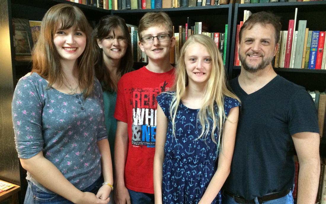 The LeCroys from Colleville, Texas, stopped by the Ol' Curiosities &amp;amp; Book Shoppe in Monroeville to order a copy of "Go Set a Watchman" and visit the hometown of their hero, Harper Lee. From the right: Kenneth, Macy, Myles, Tara and Mallory. Photo: Bo Emerson