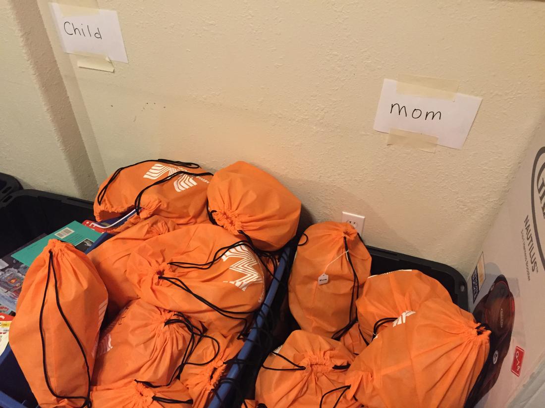 Volunteers offer care packages to women and children recently released from South Texas immigration detention centers.Jeremy Redmon\/jredmon@ajc.com