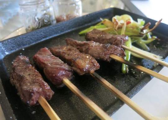 Tapas at La Dulce in Royal Oak include skewers of rib eye with grilled vegetables and jars of red and green mojo sauce. Sylvia Rector, Detroit Free Press