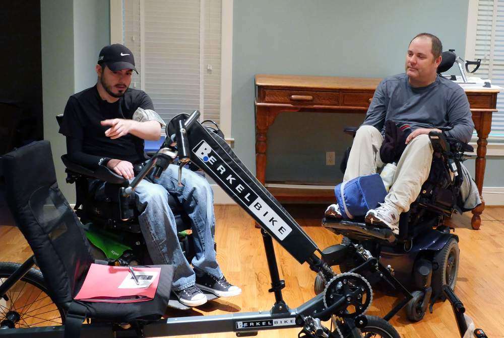 Health-care innovator Ross Mason (right) was so impressed by Ignacio's positive attitude and determination that he invited him to live in the apartment of his wheelchair-accessible home. \/ Photo by Hyosub Shin \/ hshin@ajc.com