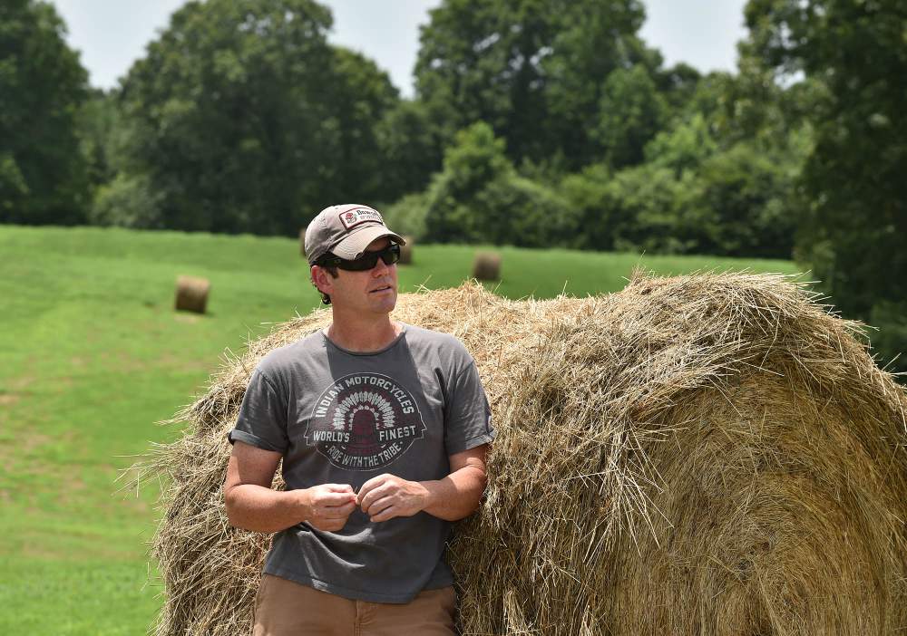 Chicken farmer Johnathan Burns at his Carroll County farm. Photo: Brant Sanderlin \/ bsanderlin@ajc.com