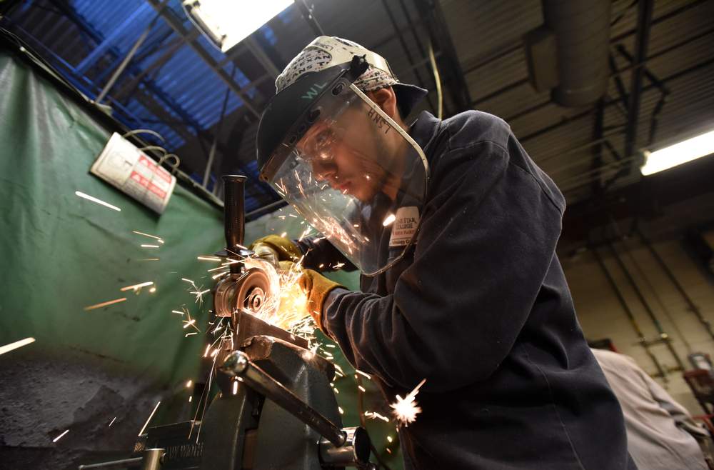 <strong>Welding Technology student</strong> Pedro Romero works on his August 13 final exam in the Applied Technology Department at the Lone Star College -- North Harris campus.<br /><br /><strong>Photo: Hyosub Shin / AJC</strong>