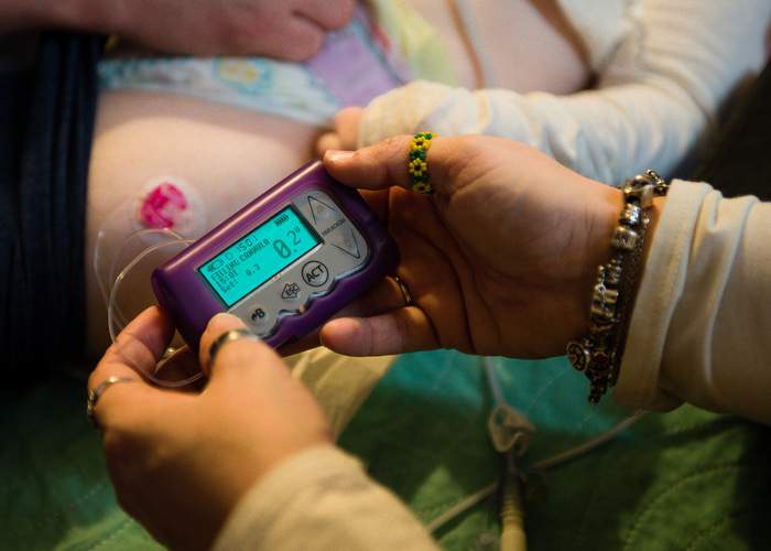 Janea administers insulin for diabetes to Haleigh.