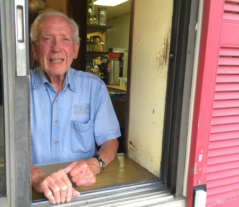 H.L. "Sam" Therrell, owner of Radley's Fountain &amp; Grille, stands at the take-out window of his restaurant, where he recalls sending a happy Nelle Harper Lee off with a carton of potato soup. Photo: Bo Emerson