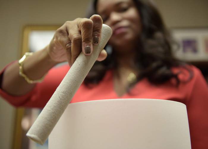 Amani demonstrates a singing bowl in her office at Northside Hospital.