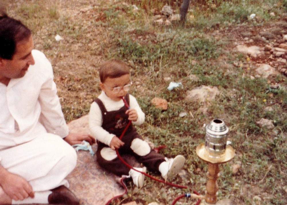 Heval in Syria with his father, Kemal. Contributed photo