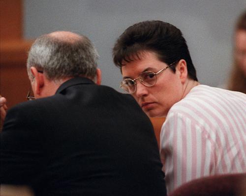 Kelly Gissendaner and one of her lawyers,  Ed Wilson,  during opening statements of her murder trial in 1998. <br /><em>(Louie Favorite, AJC file)</em>