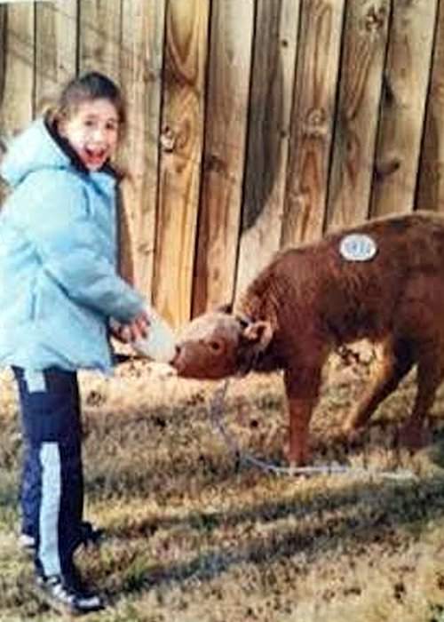 Julia feeding Brownie the calf. Contributed photo
