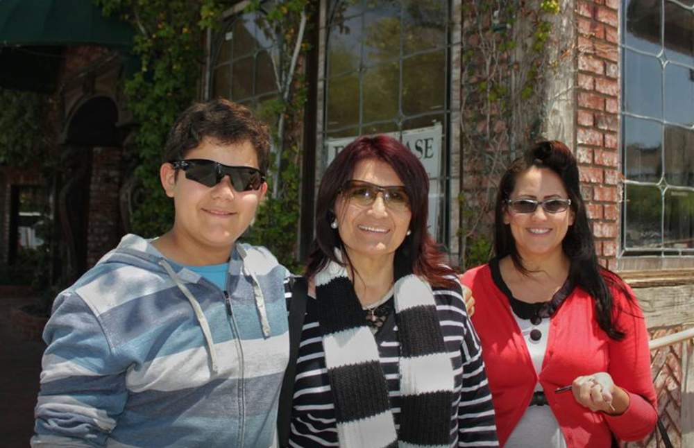 Maria, with her daughter and grandson, celebrating her birthday last May. From left to right: Ethan, 13 , Maria, and Monica, 32.