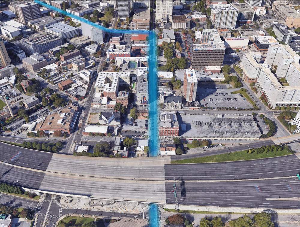 The march continued on Auburn Avenue under the Downtown Connector. It passed between the Oddfellows Building and the Herndon Building (now gone) before passing Big Bethel AME Church. The march turned left onto Courtland Street, where today's Auburn Avenue Research Library now sits. (Google Earth) The march continued on Auburn Avenue under the Downtown Connector. It passed between the Oddfellows Building and the Herndon Building (now gone) before passing Big Bethel AME Church. The march turned left onto Courtland Street, where today's Auburn Avenue Research Library now sits. (Google Earth)