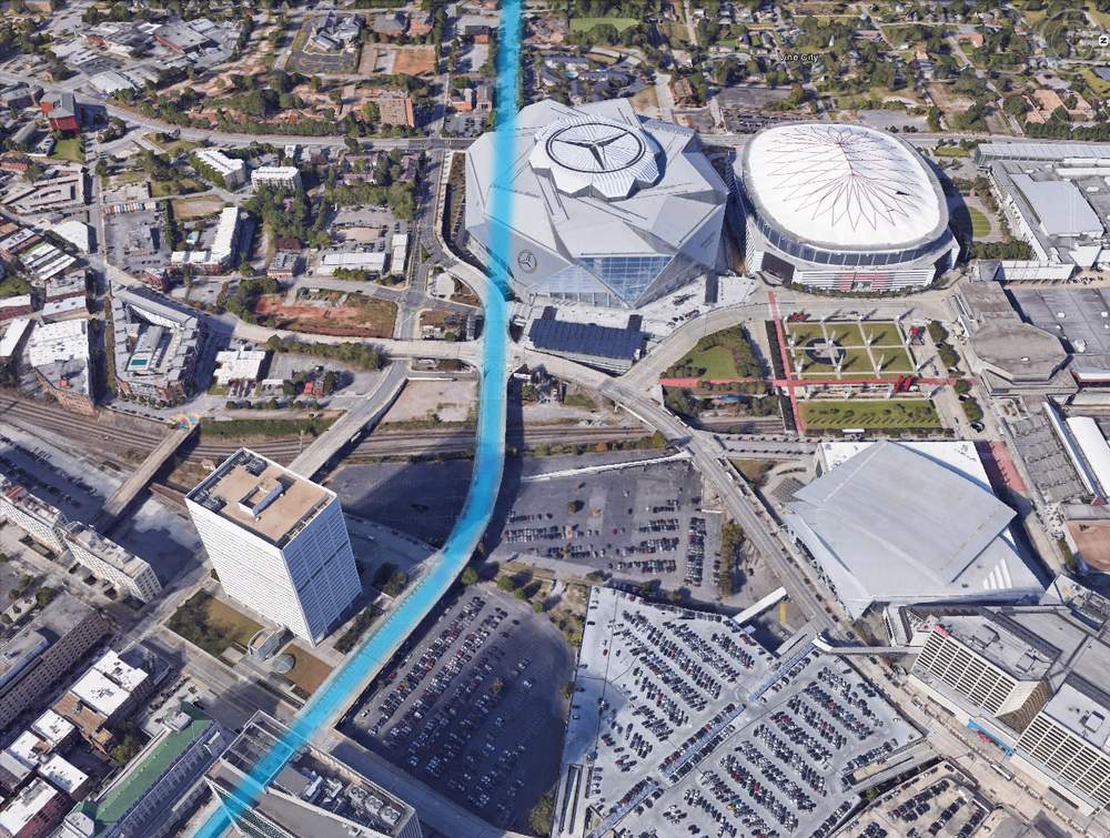Marchers passed the old Terminal Station building (where today's Richard B. Russell Building sits at lower left), walked on the viaduct over the Gulch, and continued straight down Hunter, through the footprint of today's Mercedes-Benz Stadium. (Google Earth) Marchers passed the old Terminal Station building (where today's Richard B. Russell Building sits at lower left), walked on the viaduct over the Gulch, and continued straight down Hunter, through the footprint of today's Mercedes-Benz Stadium. (Google Earth)