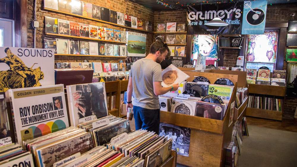 Customers browse records at Grimey's. Customers browse records at Grimey's.