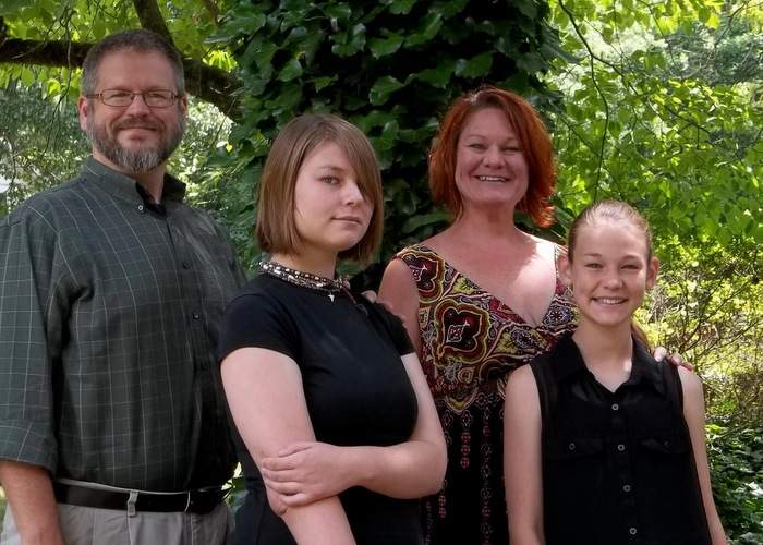 Tim (from left), Abigail, Suzanne and Sophie Morris in 2013 after Abigail underwent her first series of radiation treatments. Contributed photo