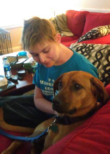 Abigail bonded with her newly adopted dog, Bourbon. Contributed photo