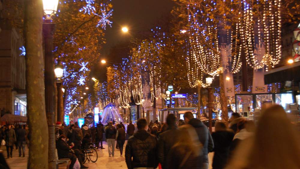 Parisians take an evening stroll through the city a couple of weeks after the November 13 attacks.Photo: Katie Leslie \/ AJC