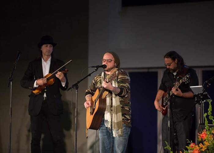 Vince Zangaro (center) performs at the 30th Anniversary Summit of the Rosalyn Carter Institute for Caring in Americus in October. Joining him on stage are Matthew Trautwein (left) and Bradd Poole. Contributed photo