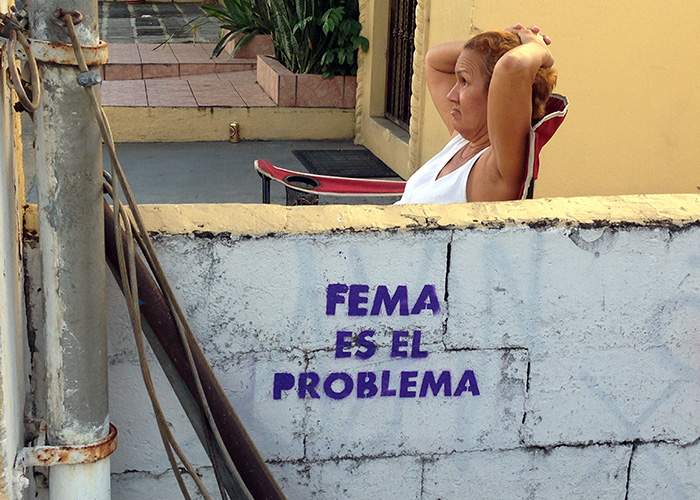 Street graffiti in Santurce takes FEMA to task. A bystander said most Puerto Ricans did not share this sentiment. Suzanne Van Atten \/ svanatten@ajc.com
