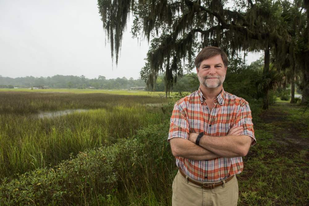 Clark Alexander, director of the Applied Coastal Research Laboratory at the Skidaway Institute of Oceanography, is photographed on the causeway connecting the Savannah communities of Sandfly and Isle of Hope. Many residential areas of Chatham County are very close to sea level, leaving them prone to localized flooding during heavy rain, especially when accompanied by high tides.PHOTO: John Carrington / Special