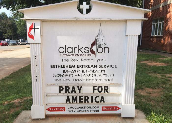 A sign outside Clarkston United Methodist Church where, in addition to the traditional Sunday morning service, six partner congregations conduct their own services every weekend. Photo by Jill Vejnoska, jvejnoska@ajc.com
