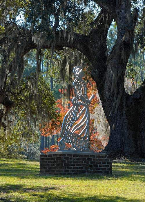 Babette Bloch’s stainless steel sculpture of an enslaved African woman is along Brookgreen Gardens’ gorgeous Lowcountry Trail. CONTRIBUTED BY BROOKGREEN GARDENS