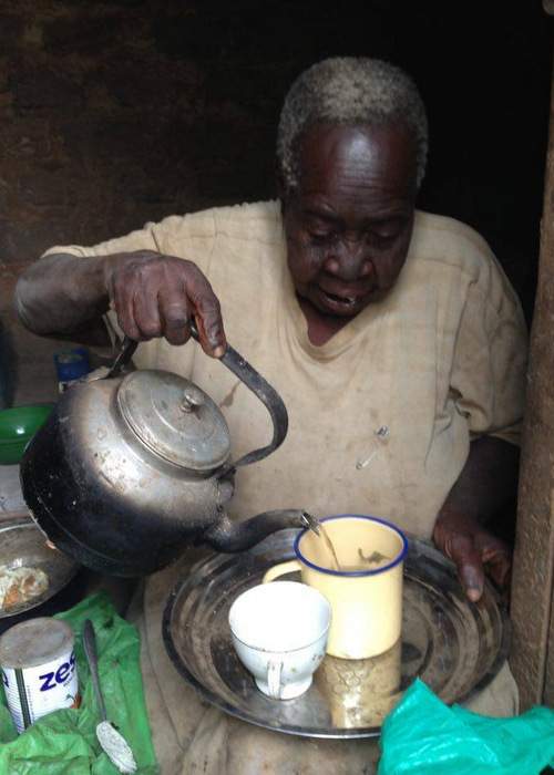 Keifah relied on passersby to bring her water from a nearby well. She carefully rationed her water use so two jugs would last a week.  Contributed photo.