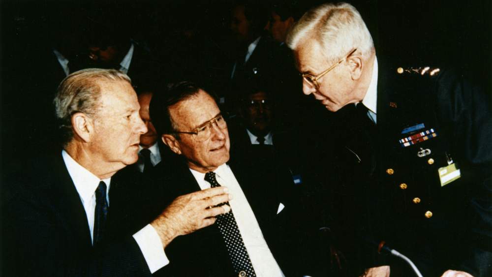Galvin confers with Secretary of State James Baker and President George H.W. Bush at the NATO Summit in Rome in 1991.