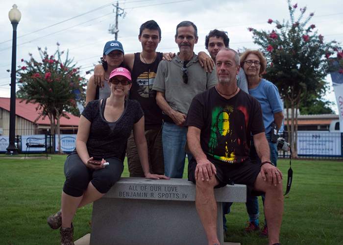 Viki's new family visits Ben's memorial bench in Woodstock. Contributed photo