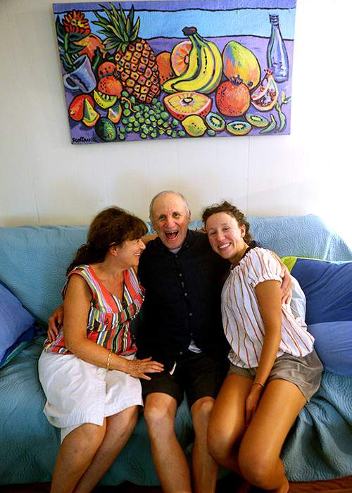 Daniel with his wife Sylvia (left) and daughter Hannah in the living room of their Edisto Island, S.C., home.    Curtis Compton\/ccompton@ajc.com