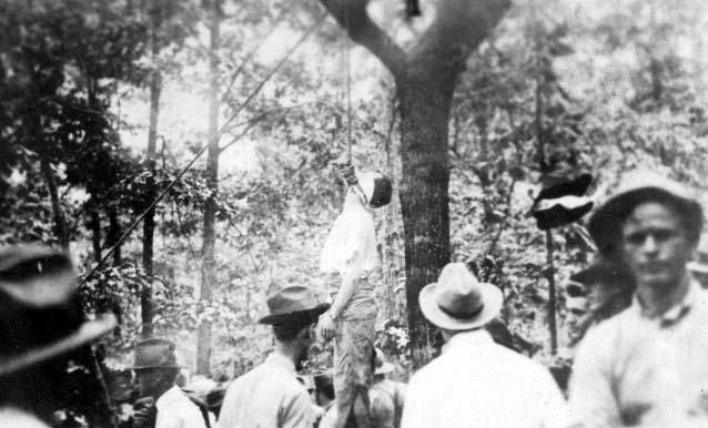 GRAPHIC CONTENT: Frank's body hangs from a tree in Marietta, 1915. The lynchers were never identified.PHOTO: The William Breman Jewish Heritage Museum