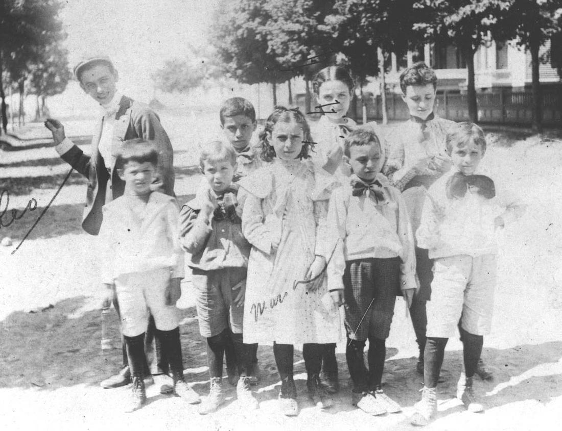 Frank (back row, far left) and sister Marian (front row, center) pose with childhood friends in Brooklyn, 1894.PHOTO: The William Breman Jewish Heritage Museum