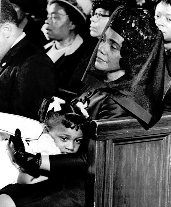 Coretta Scott King and her daughter Bernice, 5, are shown April 9, 1968, attending the funeral of her husband in this Pulitzer-prize winning photograph taken by Moneta J. Sleet, Jr. Sleet was the first African-American to win a Pulitzer Prize for photography. AP Photo\/Moneta J. Sleet, Jr.